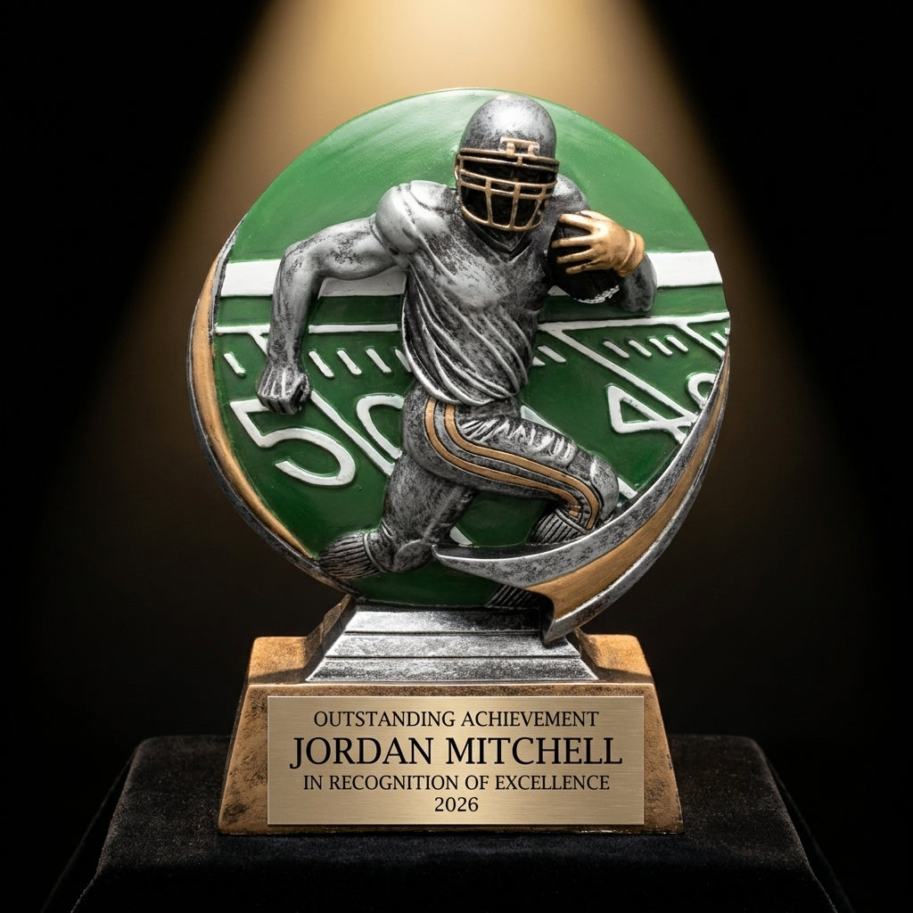 Personalized Color Football Player Resin Trophy resin award on black velvet under awards-ceremony spotlight, engraved champion and lifetime achievement award