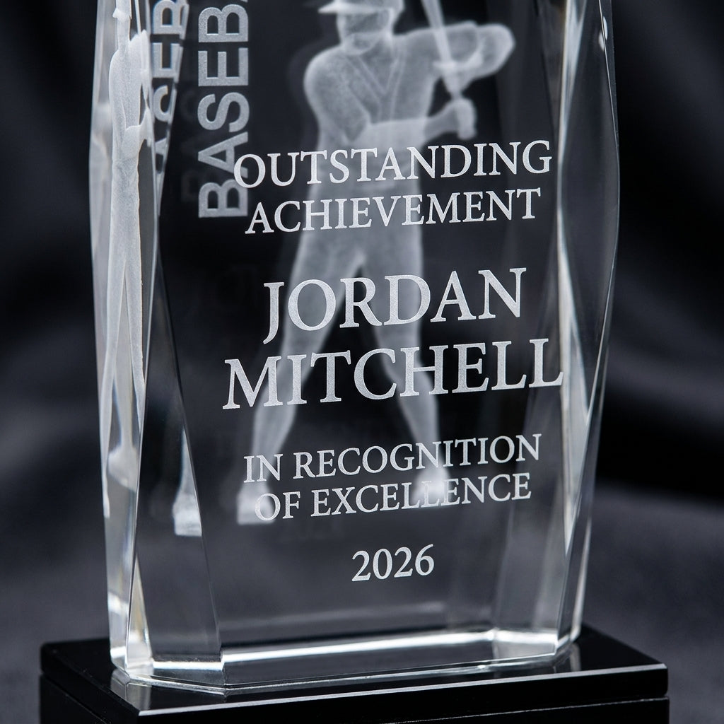 Close-up of the custom laser engraving on a personalized Crystal Tower 3D Baseball Award crystal award, showing crisp permanent personalization