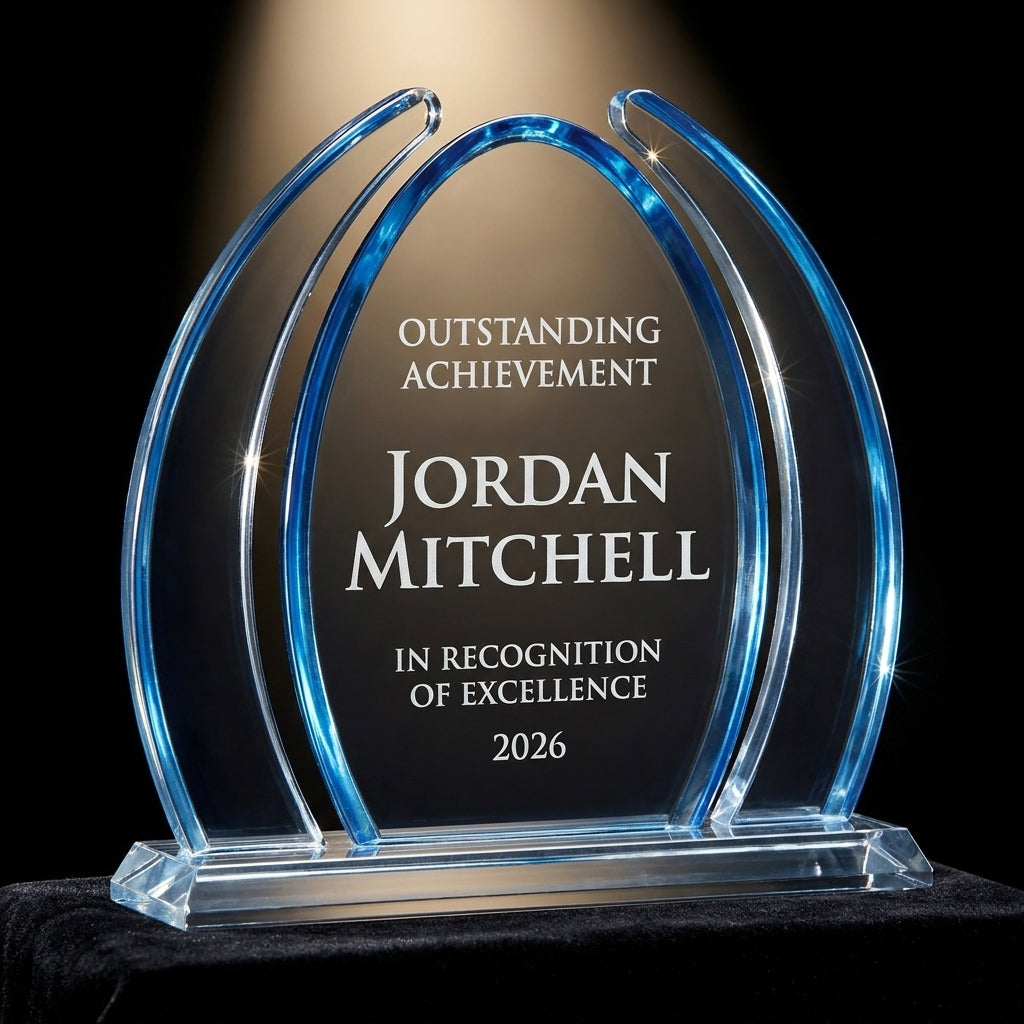 Personalized Dyn Enterprise acrylic award on black velvet under awards-ceremony spotlight, engraved champion and lifetime achievement award