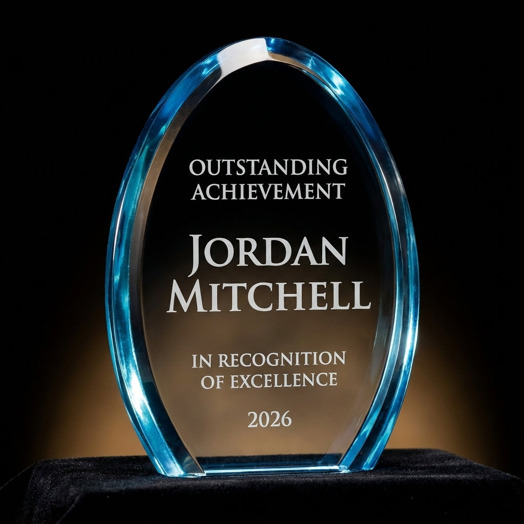 Personalized Dyn acrylic award on black velvet under awards-ceremony spotlight, engraved champion and lifetime achievement award