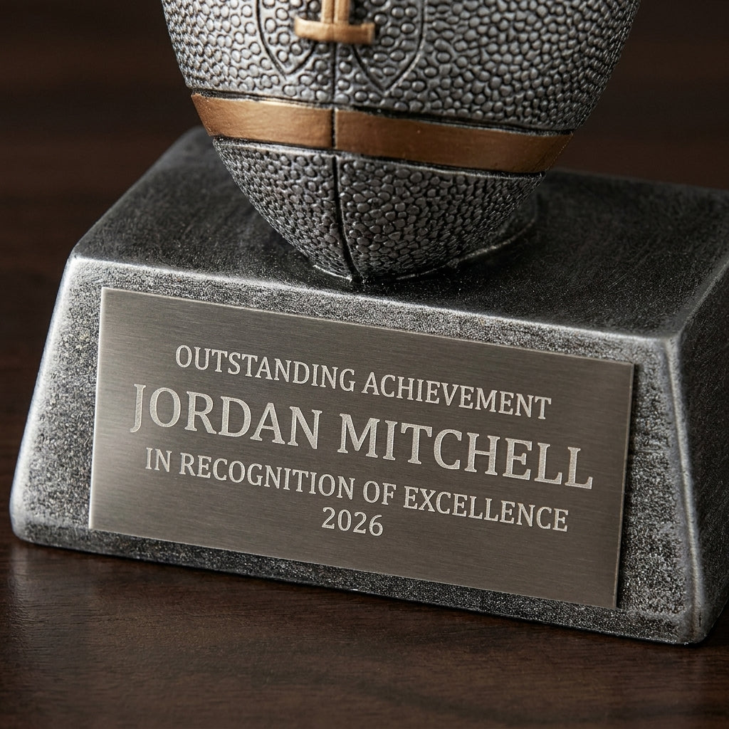 Close-up of the custom laser engraving on a personalized Football Imperial Resin Award resin award, showing crisp permanent personalization