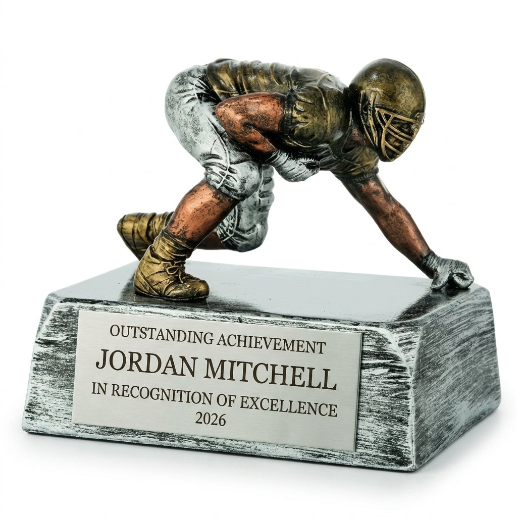 Personalized Football Lineman Resin Trophy resin award, custom laser engraved recognition award on a clean white studio background
