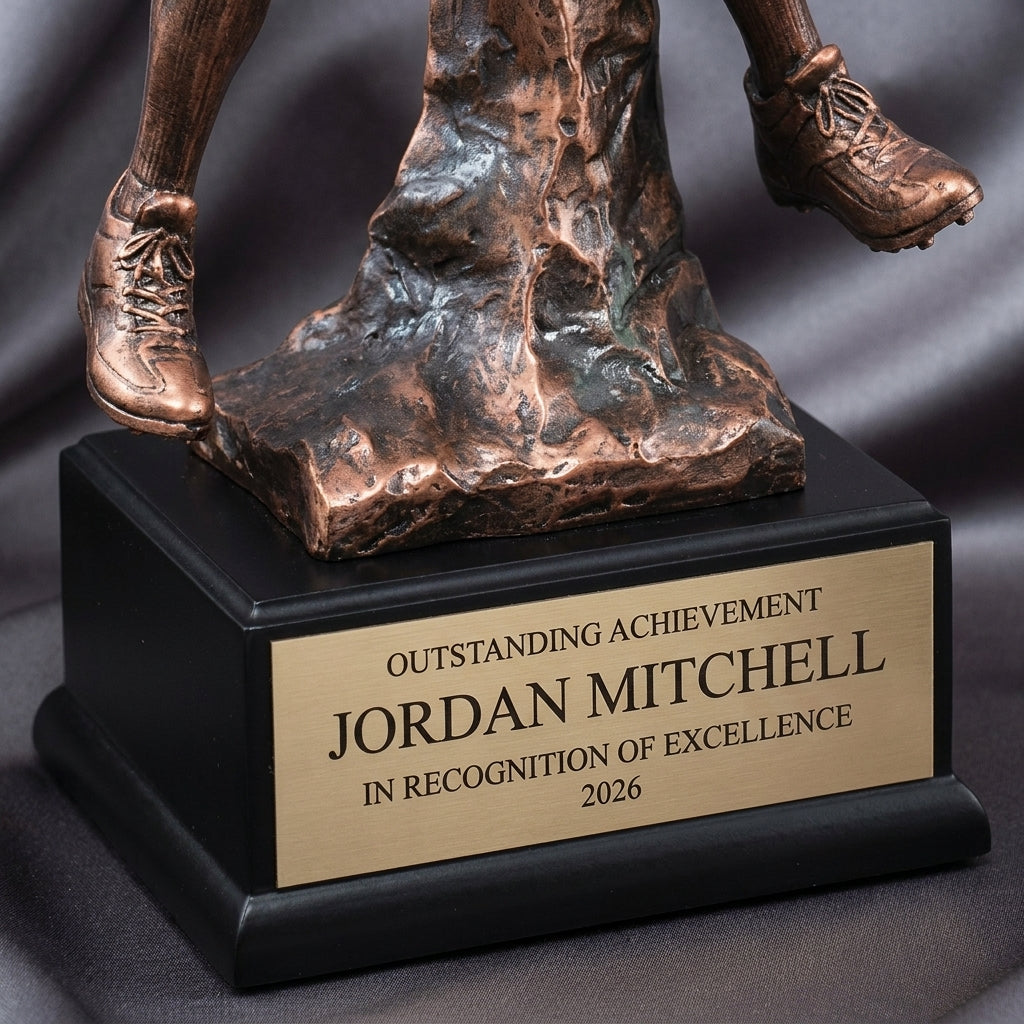 Close-up of the custom laser engraving on a personalized Football Quarterback Resin Trophy resin award, showing crisp permanent personalization