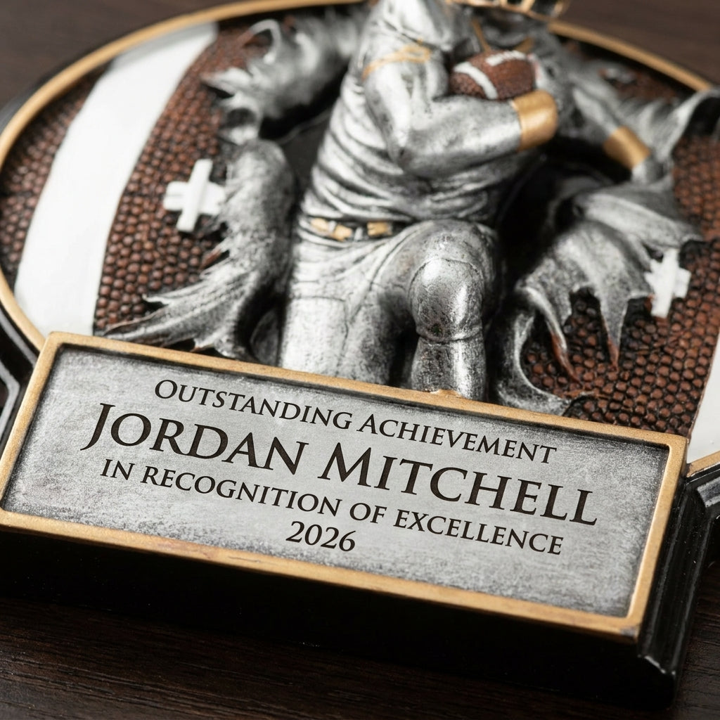 Close-up of the custom laser engraving on a personalized Football Resin Plaque Award resin award, showing crisp permanent personalization