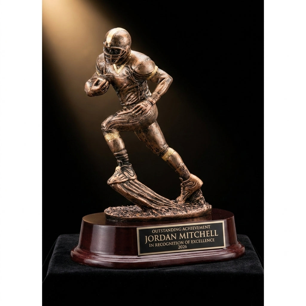 Personalized Football Runner Resin Trophy resin award on black velvet under awards-ceremony spotlight, engraved champion and lifetime achievement award