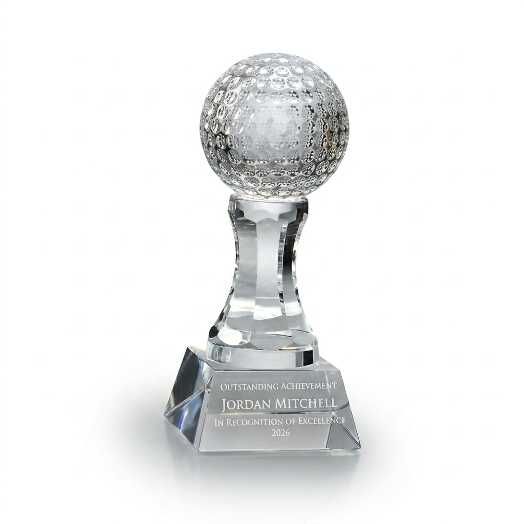 Personalized Golf Ball crystal award, custom laser engraved recognition award on a clean white studio background