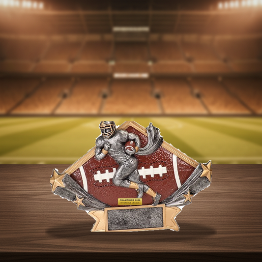 Personalized Football Resin Trophy Award resin award on a warm executive desk with a green banker's lamp, engraved corporate recognition and retirement gift