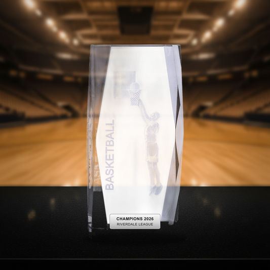Personalized Crystal Tower 3D Basketball Award crystal award on a warm executive desk with a green banker's lamp, engraved corporate recognition and retirement gift