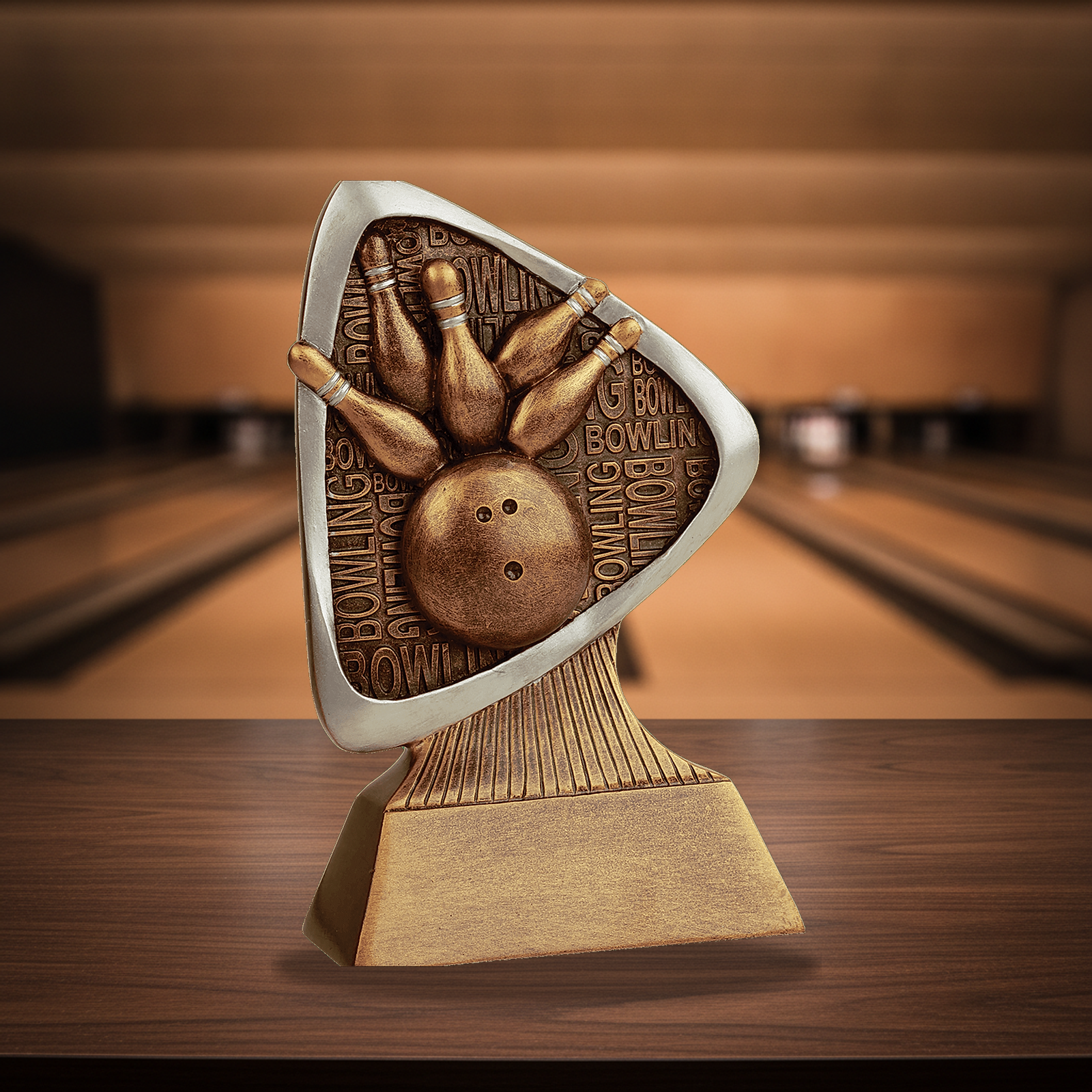 Personalized Bowling Triad Resin Award resin award on a warm executive desk with a green banker's lamp, engraved corporate recognition and retirement gift