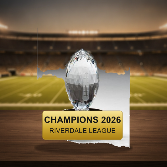 Personalized Football Upright On Black Base Trophy resin award on a warm executive desk with a green banker's lamp, engraved corporate recognition and retirement gift