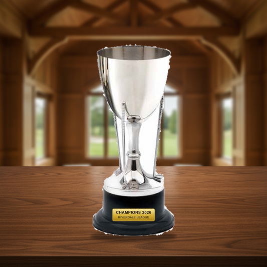 Personalized Golf Cup On Stand Nickel Plated cup trophy on a warm executive desk with a green banker's lamp, engraved corporate recognition and retirement gift