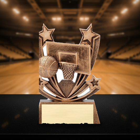 Personalized Twin Stars Basketball Award resin award on a warm executive desk with a green banker's lamp, engraved corporate recognition and retirement gift