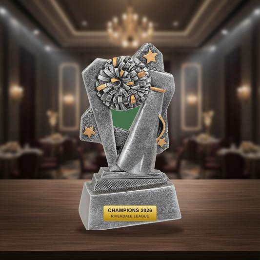 Personalized Cheer Triumph Resin Award resin award on a warm executive desk with a green banker's lamp, engraved corporate recognition and retirement gift