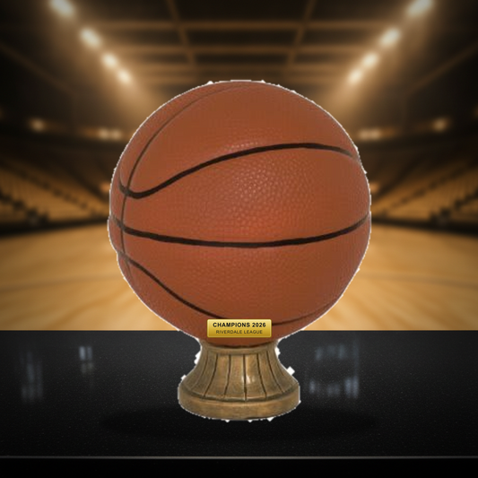 Personalized Basketball Resin Trophy Award resin award on a warm executive desk with a green banker's lamp, engraved corporate recognition and retirement gift