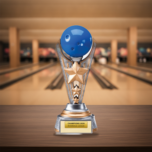 Personalized Full Color Bowling Award resin award on a warm executive desk with a green banker's lamp, engraved corporate recognition and retirement gift