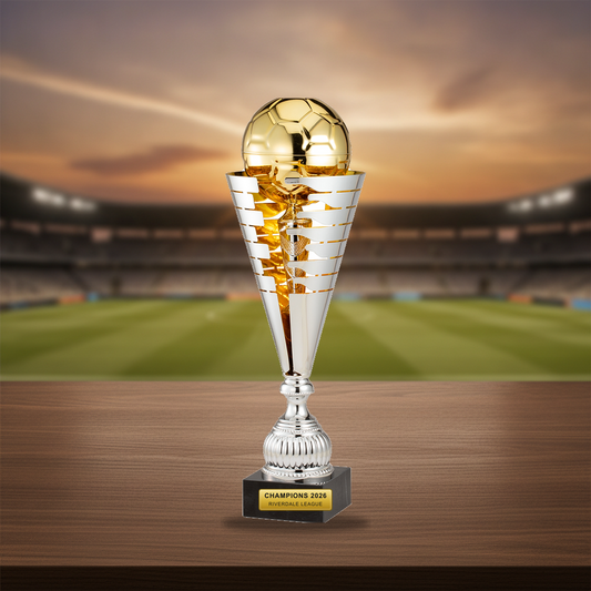 Personalized Silver/Gold Italian Soccer Cup cup trophy on a warm executive desk with a green banker's lamp, engraved corporate recognition and retirement gift