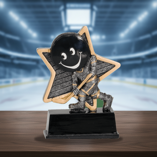 Personalized Hockey Little Pal Resin Award resin award on a warm executive desk with a green banker's lamp, engraved corporate recognition and retirement gift