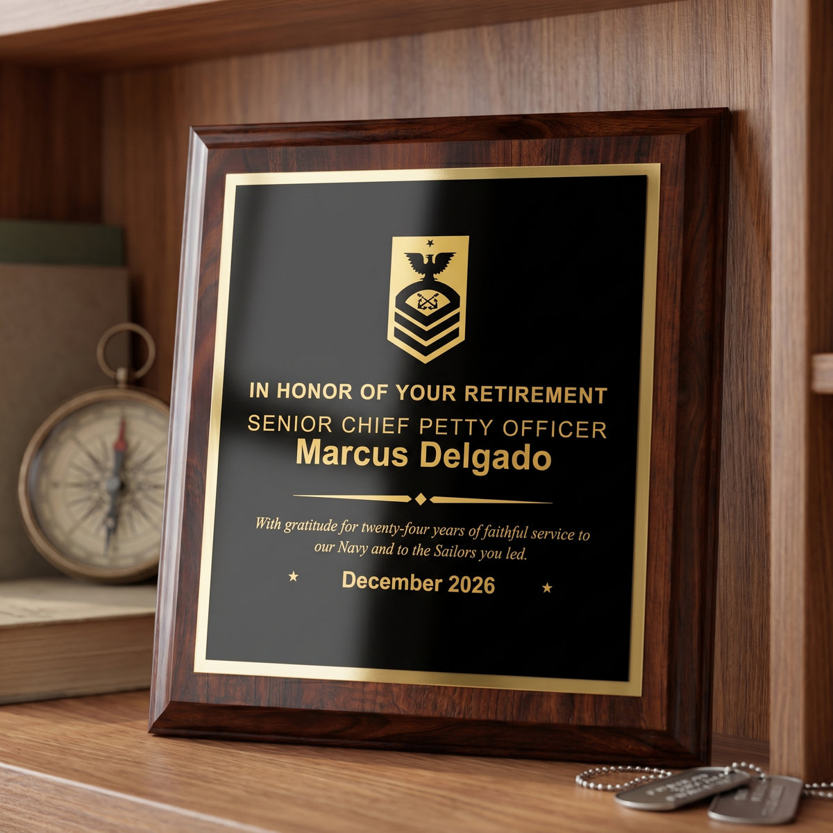 Navy Senior Chief Petty Officer retirement plaque in cherry finish with gold engraved insignia and a twenty-year service message, displayed on a shelf