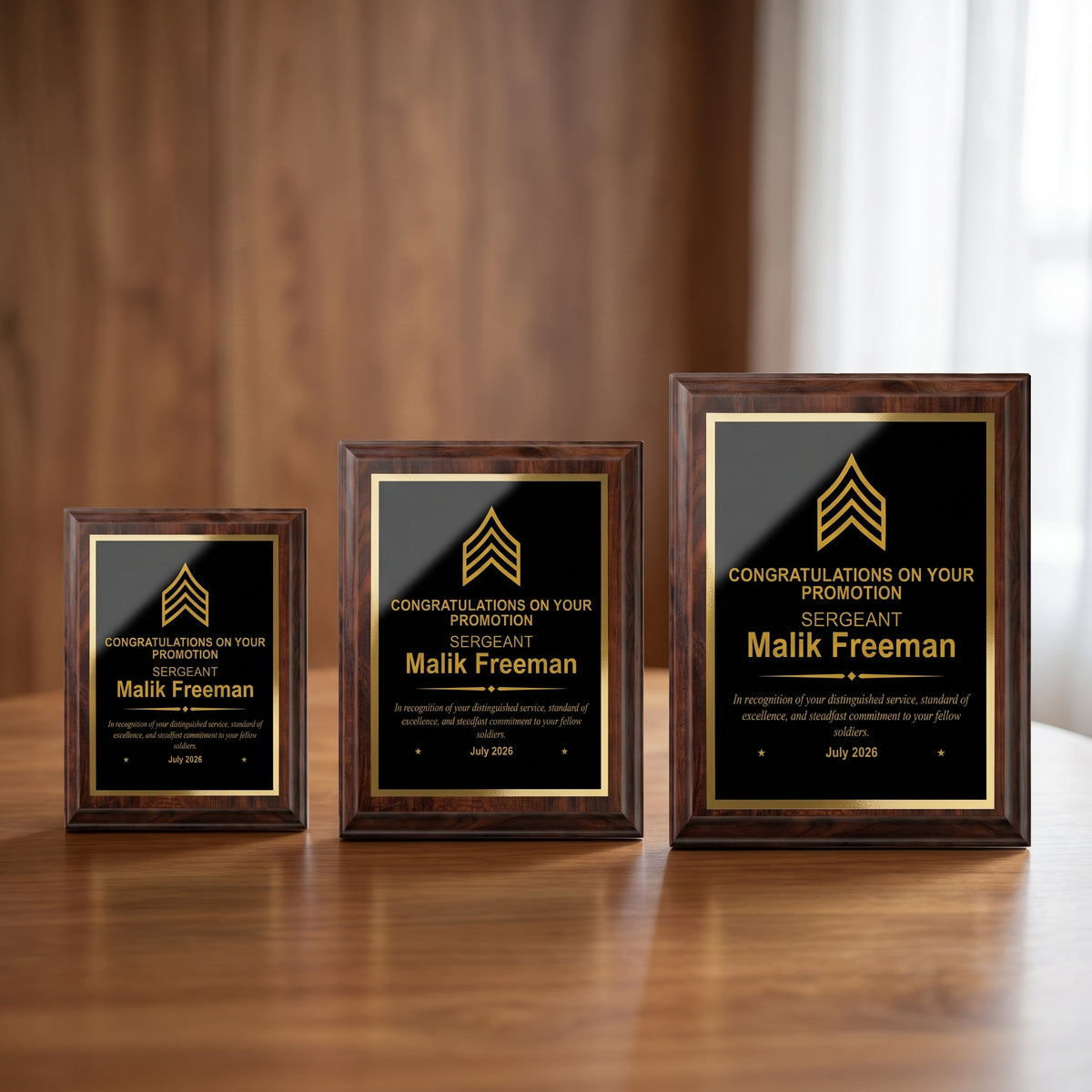 Small, medium, and large Army cherry plaques side by side showing the engraved Sergeant insignia and name scaled to each plaque size