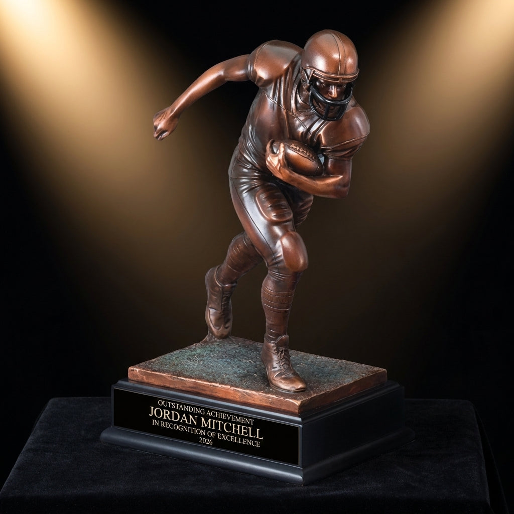 Personalized Large Football Player Resin Trophy resin award on black velvet under awards-ceremony spotlight, engraved champion and lifetime achievement award
