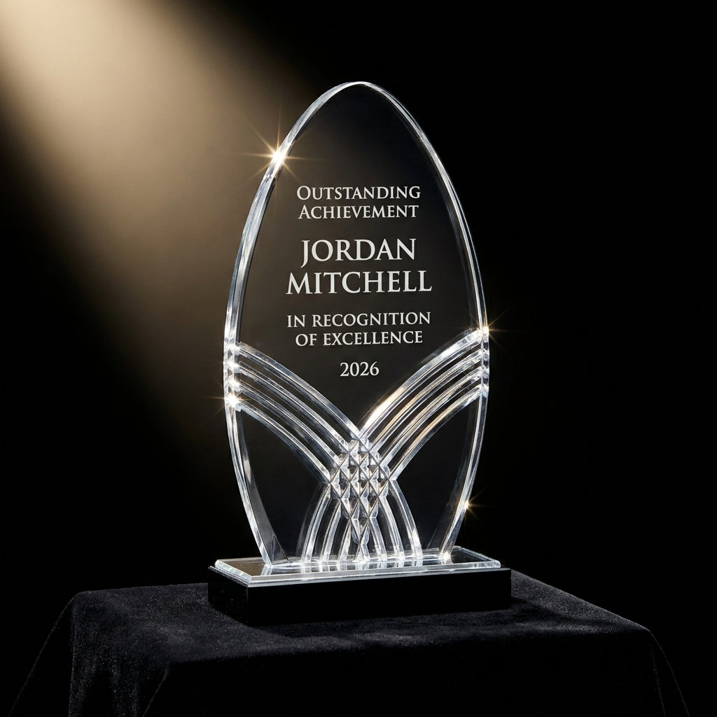 Personalized Nile Arrow Black acrylic award on black velvet under awards-ceremony spotlight, engraved champion and lifetime achievement award