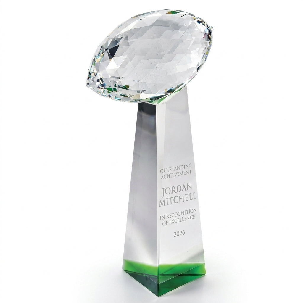 Personalized Optical Crystal Football Tower Award crystal award, custom laser engraved recognition award on a clean white studio background
