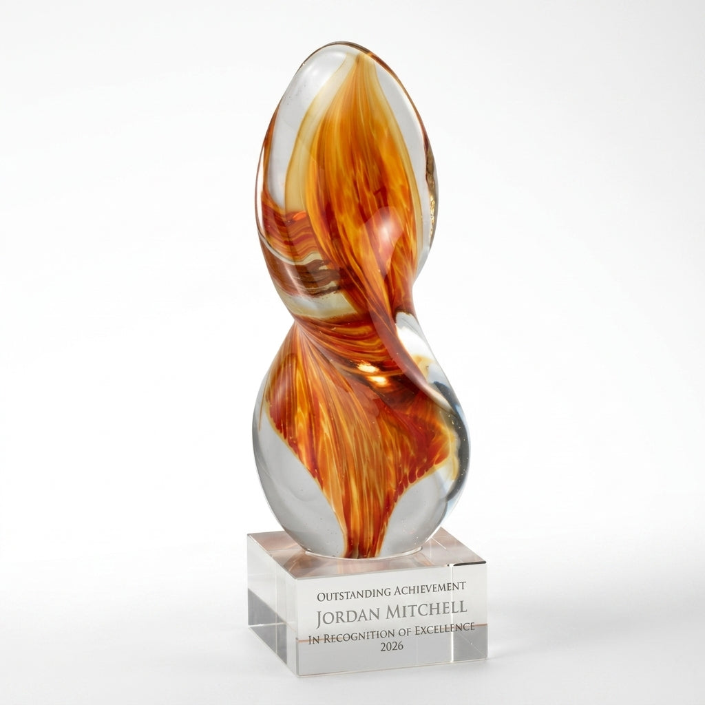 Personalized Orange Flame Clear Base art glass award, custom laser engraved recognition award on a clean white studio background