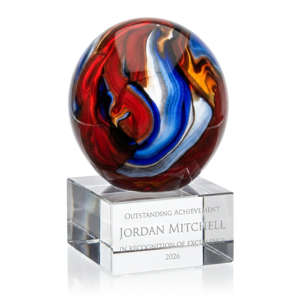 Personalized Swirl Globe Red Blue art glass award, custom laser engraved recognition award on a clean white studio background