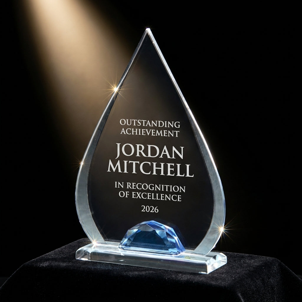 Personalized Teardrop Lucite with Glass acrylic award on black velvet under awards-ceremony spotlight, engraved champion and lifetime achievement award